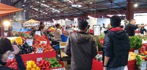 Buying vegetables at Queen Victoria Markets, Melbourne
