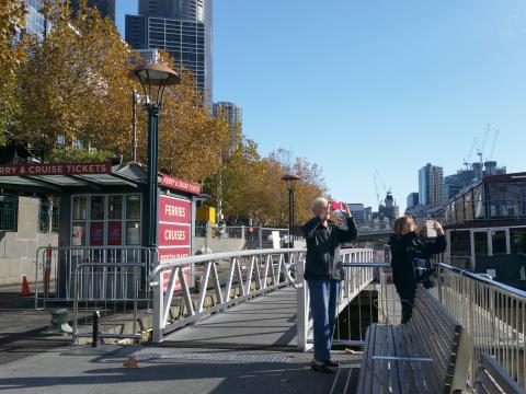 Mum and Judy taking photos of the Yarra.